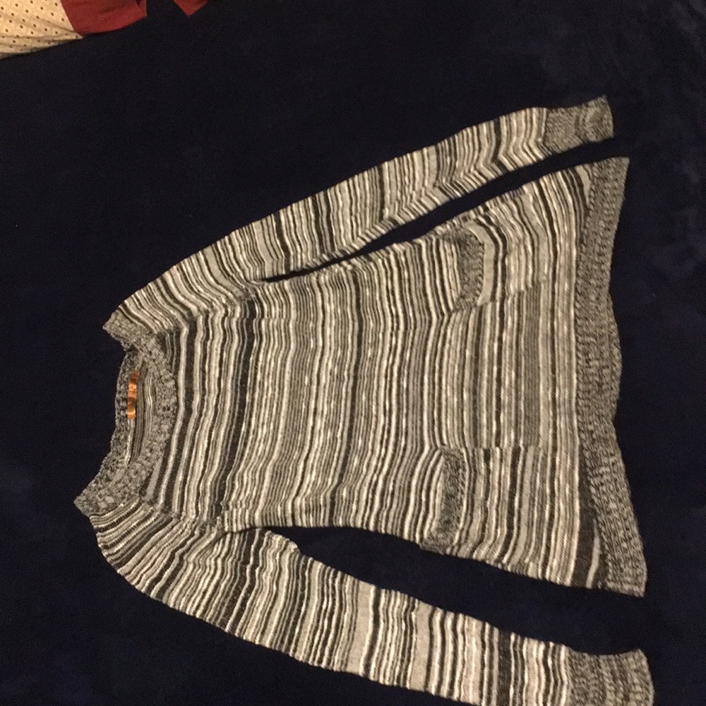 A grey and black Dress.
